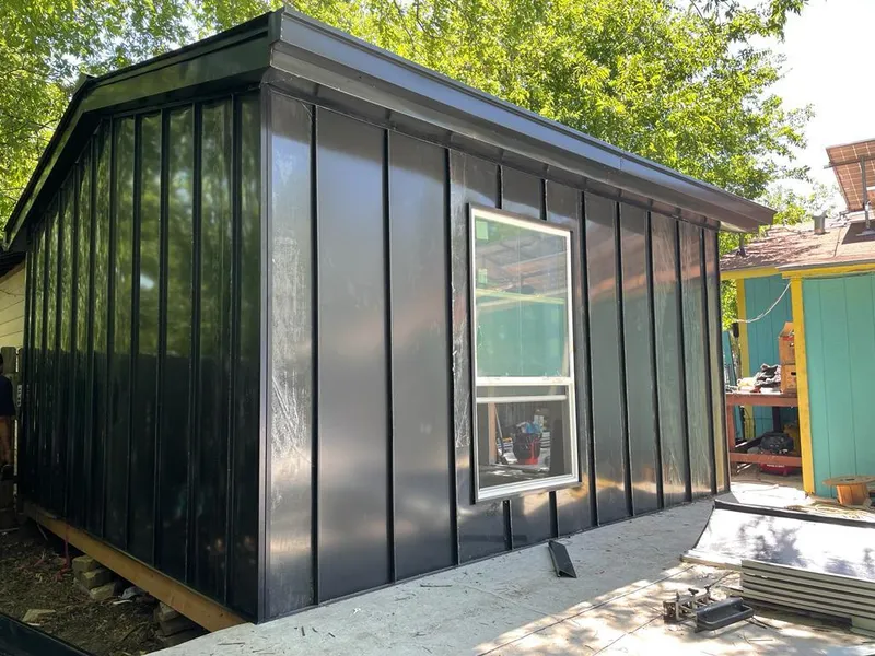 Black standing seam metal wall panels for Metal Roof Installation in Ripon