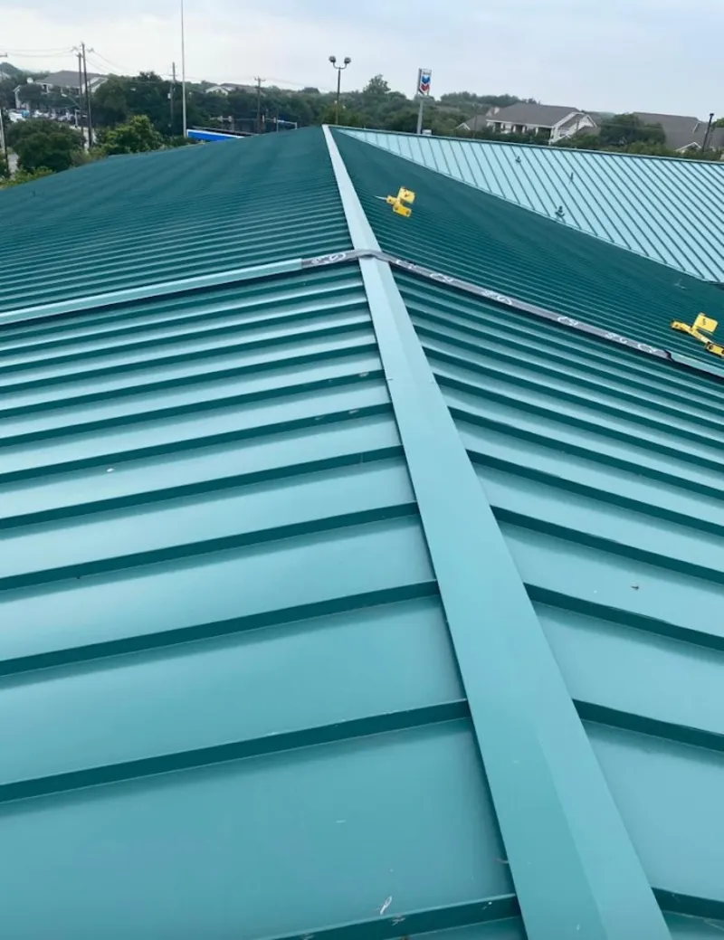 Green commercial metal roof ridge and valley for Metal Roof Repair in Ripon
